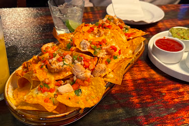 Zeppelins Food & Drinks signature dishes Cheese Wontons
Nina's Nachos
Smoked BBQ Pork Ribs